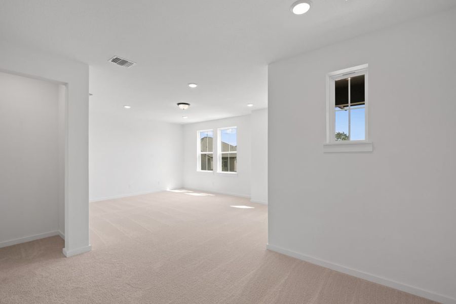 Spacious, unfurnished interior of a new home in Park Collection At Wolf Ranch, Georgetown (Image 39). Spacious, unfurnished interior of a new home in Park Collection At Wolf Ranch, Georgetown (Image 39).