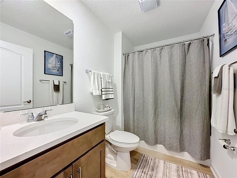 Furnished interior view inside a new home in Sawmill Branch Express, Palm Coast (Image 12).