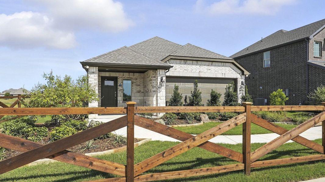 Front exterior of a new home in Silverado, Aubrey, TX, highlighting curb appeal (Image 1). Front exterior of a new home in Silverado, Aubrey, TX, highlighting curb appeal (Image 1).