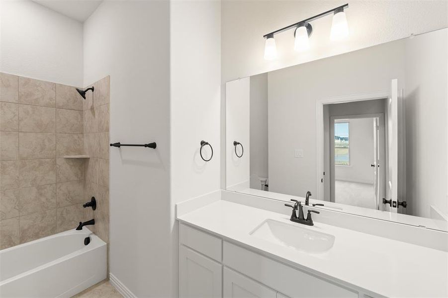 Full bath with tub / shower combination and vanity