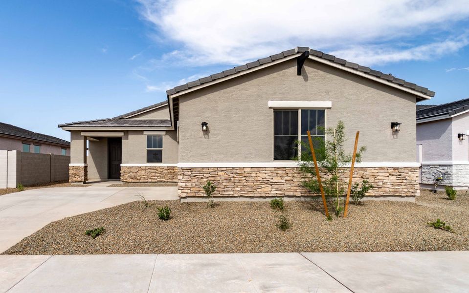 Front exterior of a new home in Rancho Santa Rosa, Maricopa, AZ, highlighting curb appeal (Image 2).