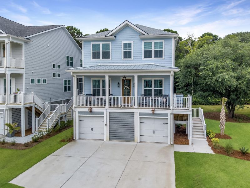 Front exterior of a new home in Overlook at Copahee Sound, Awendaw, SC, highlighting curb appeal (Image 24).