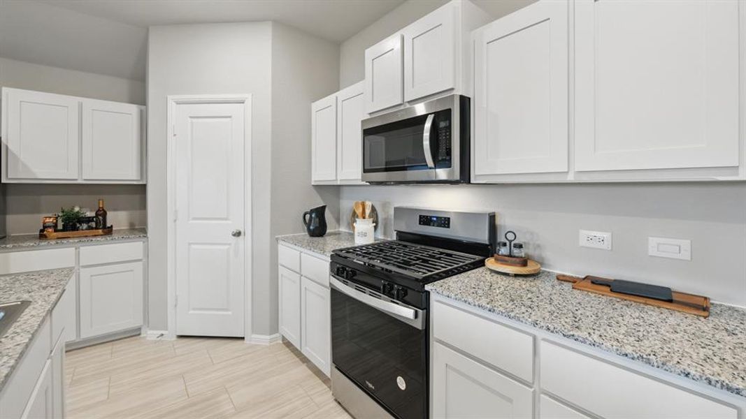 Furnished interior view inside a new home in Lonestar at Liberty Trails, Fort Worth (Image 12).