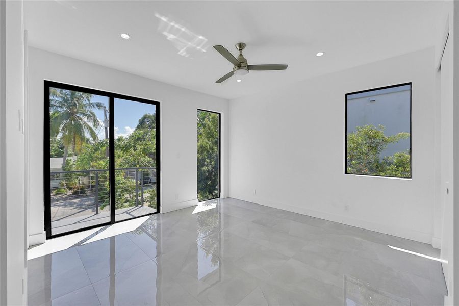 Third bedroom, with an on-suite bathroom and a balcony.