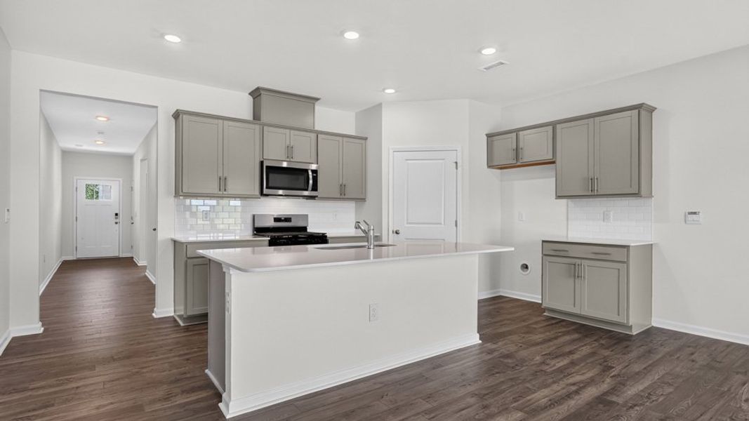 Furnished interior view inside a new home in The Grove at Matthews Landing, Fuquay Varina (Image 8).