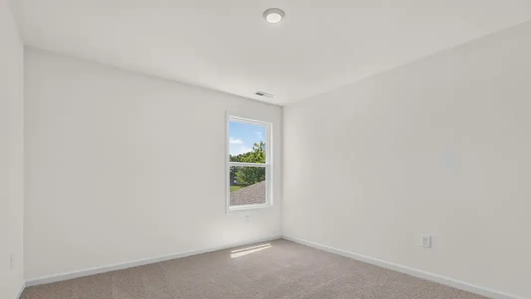 Spacious, unfurnished interior of a new home in Madden West, Fuquay Varina (Image 25).