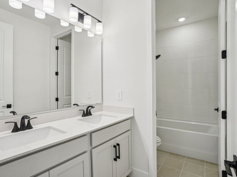 Furnished interior view inside a new home in Ridgehaven - Signature Series, Ormond Beach (Image 7).