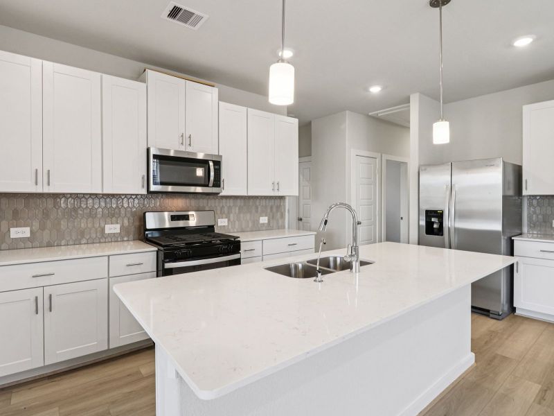 Furnished interior view inside a new home in Sanford Farms - Traditional Series, Waller (Image 4).
