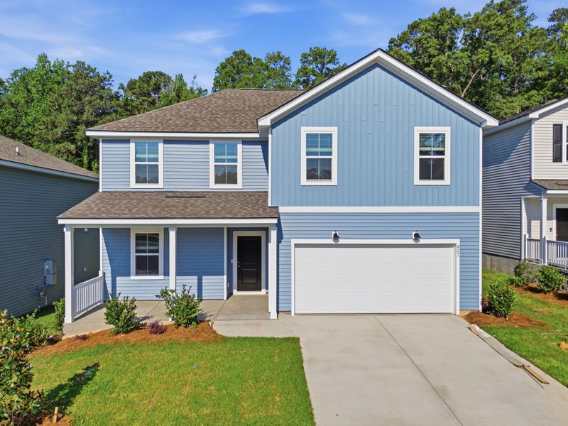 Front exterior of a new home in Grand Arbor, Blythewood, SC, highlighting curb appeal (Image 20). Front exterior of a new home in Grand Arbor, Blythewood, SC, highlighting curb appeal (Image 20).