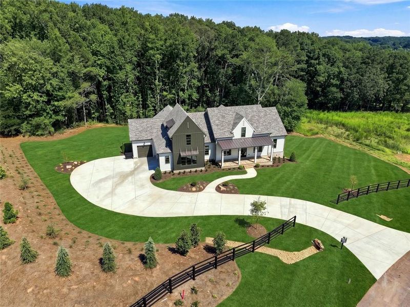 Front exterior of a new home in , Canton, GA, highlighting curb appeal (Image 32).