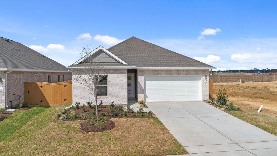 Front exterior of a new home in Cypress Green, Hockley, TX, highlighting curb appeal (Image 19). Front exterior of a new home in Cypress Green, Hockley, TX, highlighting curb appeal (Image 19).