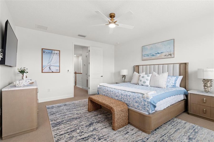 Furnished interior view inside a new home in Harvest at Ovation, Winter Garden (Image 15).