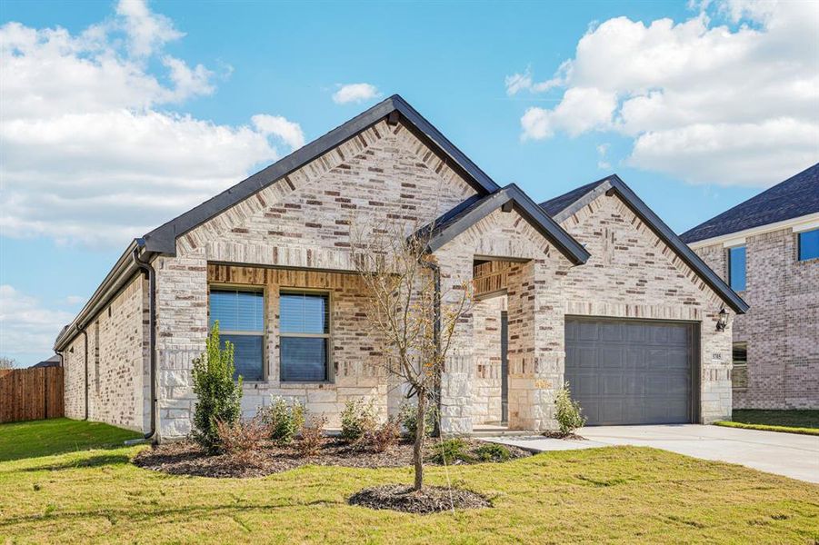Front exterior of a new home in , Princeton, TX, highlighting curb appeal (Image 23).