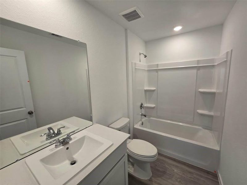 Furnished interior view inside a new home in Pinewood at Grand Texas, New Caney (Image 6). Furnished interior view inside a new home in Pinewood at Grand Texas, New Caney (Image 6).