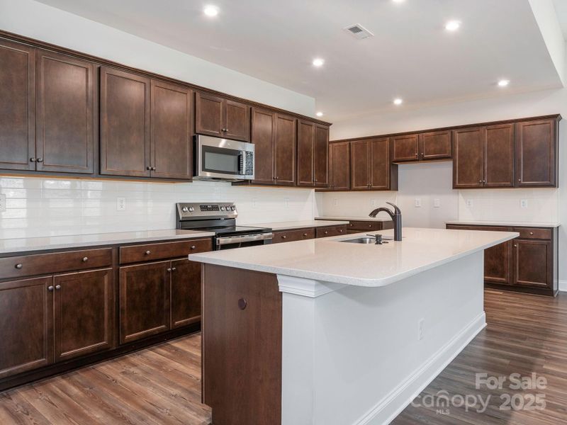 Furnished interior view inside a new home in , Charlotte (Image 8).