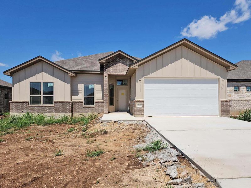 Front exterior of a new home in Eagle Heights, Salado, TX, highlighting curb appeal (Image 1).