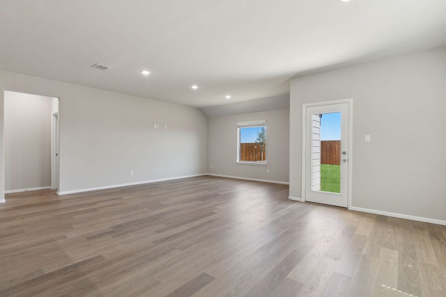 Living Room in the Harrison home plan by Trophy Signature Homes – REPRESENTATIVE PHOTO