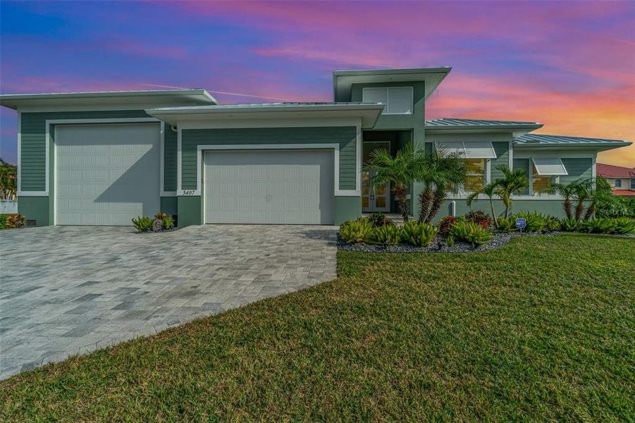 Front exterior of a new home in , Cape Coral, FL, highlighting curb appeal (Image 28).