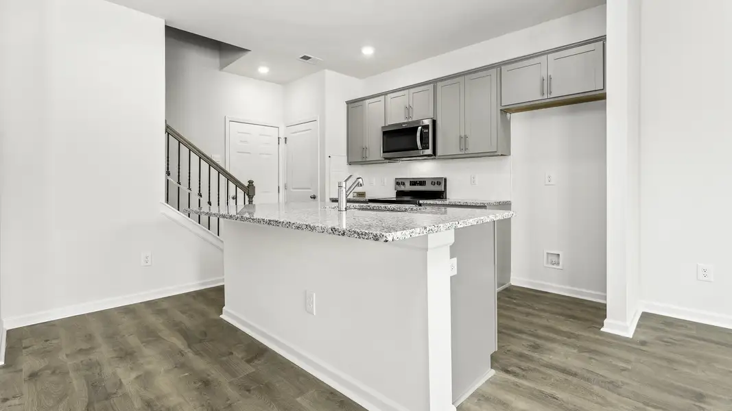 Furnished interior view inside a new home in Brightwood Farm, Whitsett (Image 3).
