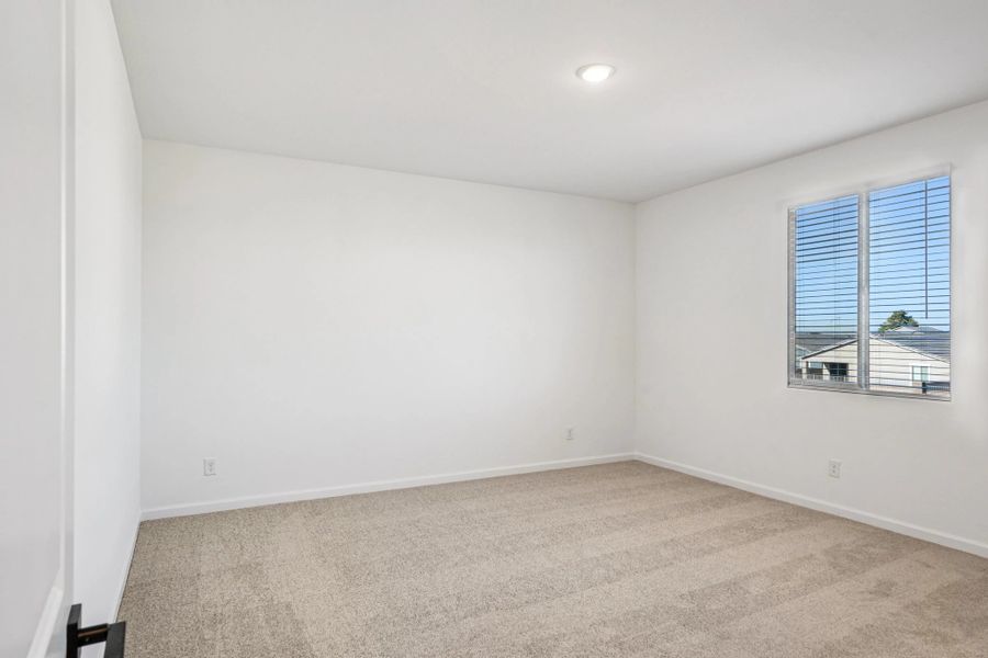Primary suite. Not actual home, finishes and options may vary by community.