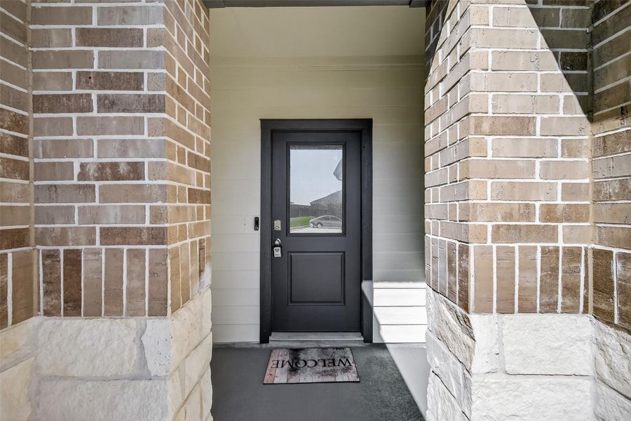 Exterior details and patio area of a home in Windstone on the Prairie, Richmond (Image 27).
