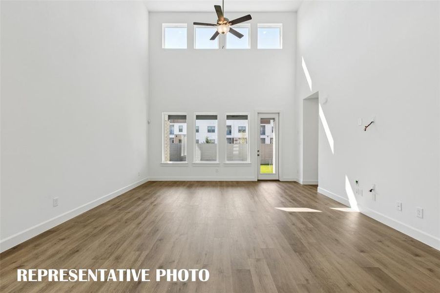 Light, bright and airy, the entire family will love this wonderful family room!  RPERESENTATIVE PHOTO
