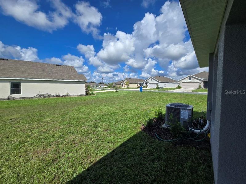 Front exterior of a new home in Twisted Oaks, Beverly Hills, FL, highlighting curb appeal (Image 17).