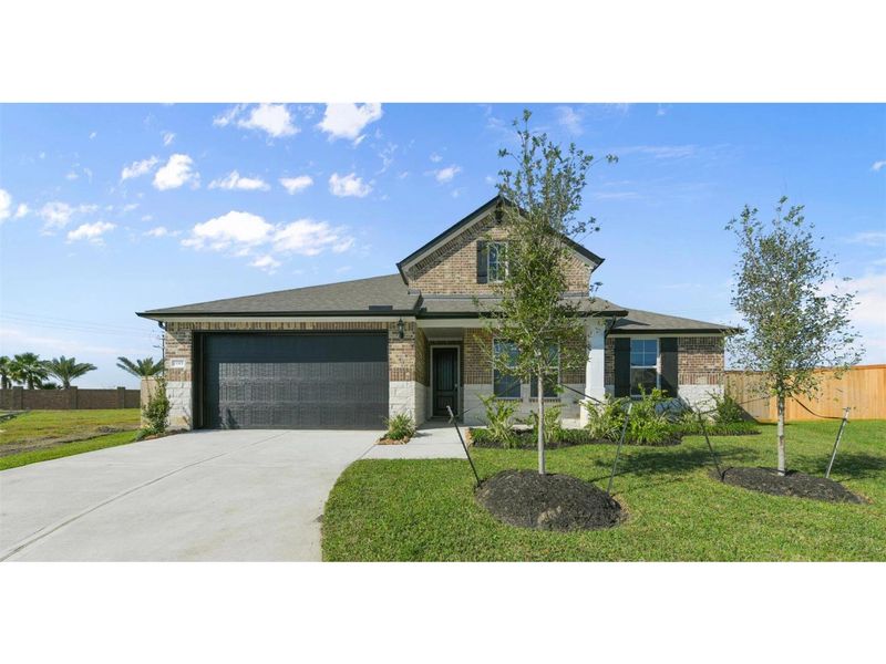 Front exterior of a new home in Lago Mar, Texas City, TX, highlighting curb appeal (Image 1). Front exterior of a new home in Lago Mar, Texas City, TX, highlighting curb appeal (Image 1).