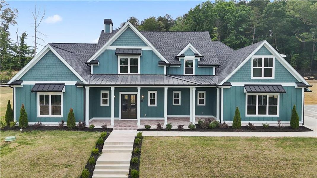 Front exterior of a new home in , Dacula, GA, highlighting curb appeal (Image 26).
