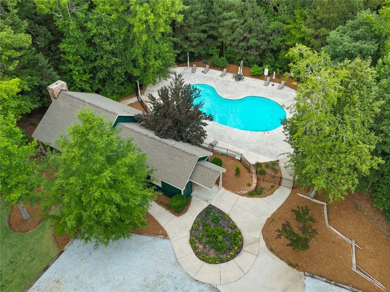 An inviting community pool beckons, perfectly nest An inviting community pool beckons, perfectly nest