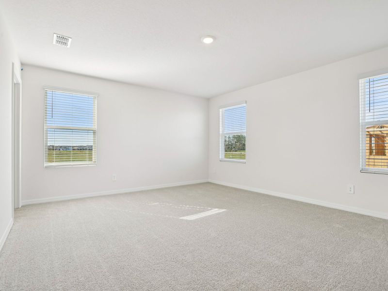 Spacious, unfurnished interior of a new home in The Meadow at Crossprairie Townes, St. Cloud (Image 9).