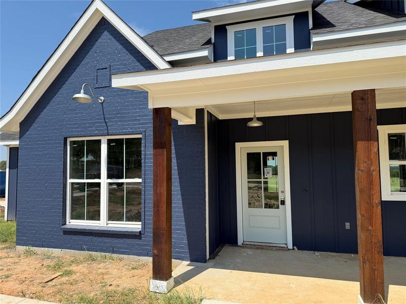 Front exterior of a new home in , Paradise, TX, highlighting curb appeal (Image 13).