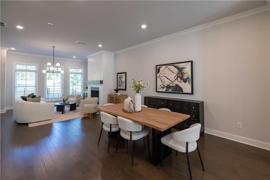 A view of the dining and living area. **Please note the photos shown are of the Jacobsen II floorplan but are not of the actual home.