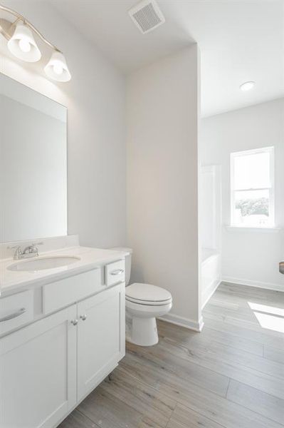 Furnished interior view inside a new home in Laurel Ridge, Rock Spring (Image 13).