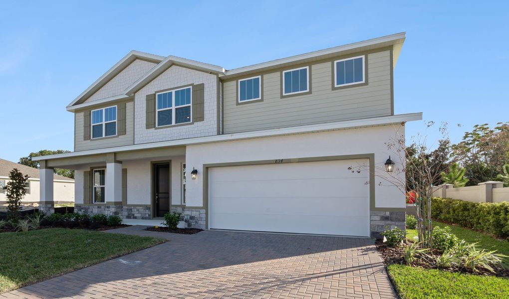 Representative exterior photo of a completed home built from the Clementine by Hartizen Homes in Eden Crest, Apopka, FL (Image 22).