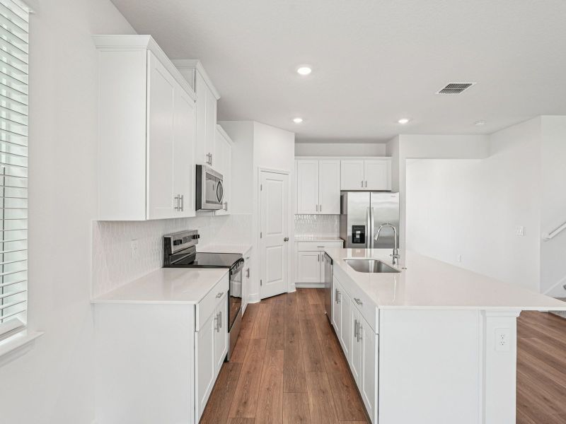 Furnished interior view inside a new home in Cyrene at Minneola, Minneola (Image 4). Furnished interior view inside a new home in Cyrene at Minneola, Minneola (Image 4).