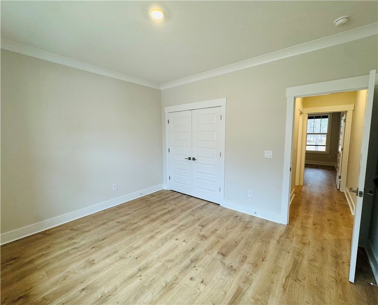 This bright room features beautiful flooring and c