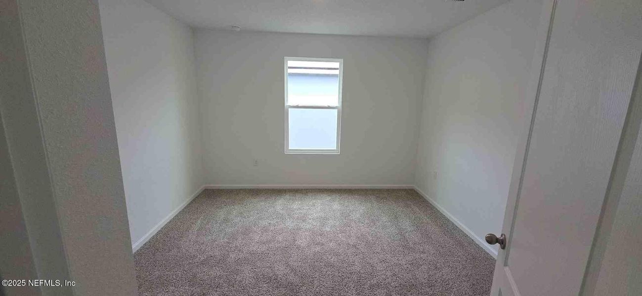 Spacious, unfurnished interior of a new home in The Arbors, Jacksonville (Image 24).