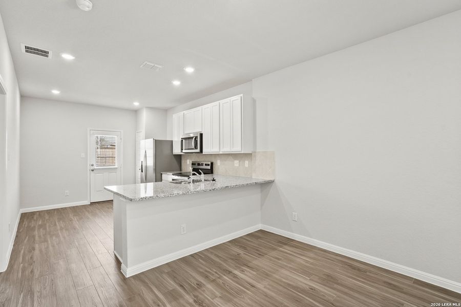Furnished interior view inside a new home in Melissa Ranch, San Antonio (Image 11).