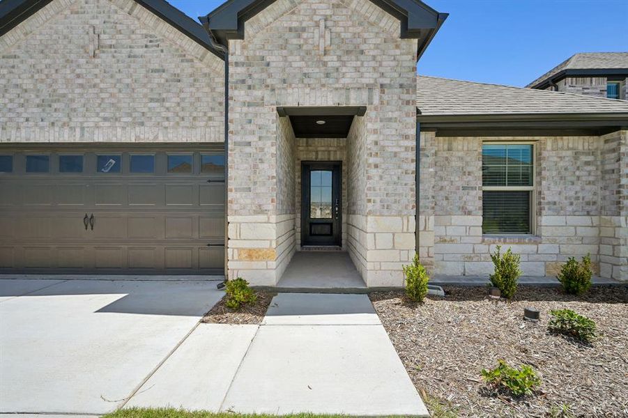Exterior details and patio area of a home in Parks at Foster Crossing - Signature Series, Anna (Image 2). Exterior details and patio area of a home in Parks at Foster Crossing - Signature Series, Anna (Image 2).