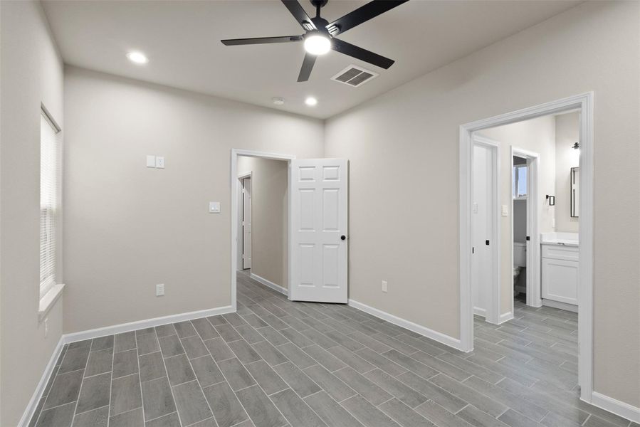Primary Bedroom with en-suite bath and oversized walk-in closet Primary Bedroom with en-suite bath and oversized walk-in closet
