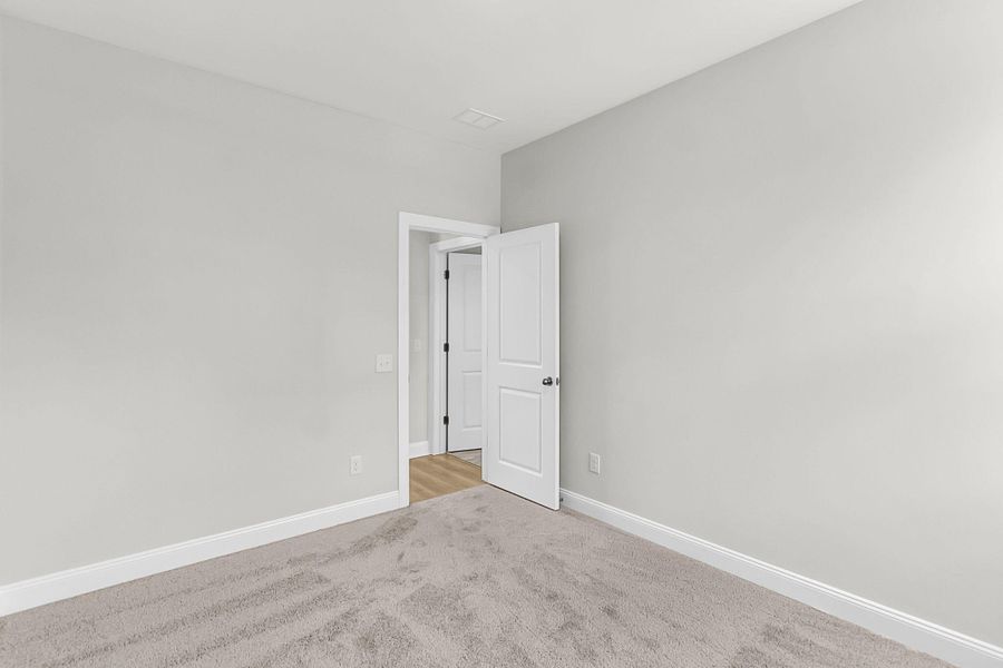 Spacious, unfurnished interior of a new home in Heron Preserve, Hanahan (Image 11). Spacious, unfurnished interior of a new home in Heron Preserve, Hanahan (Image 11).