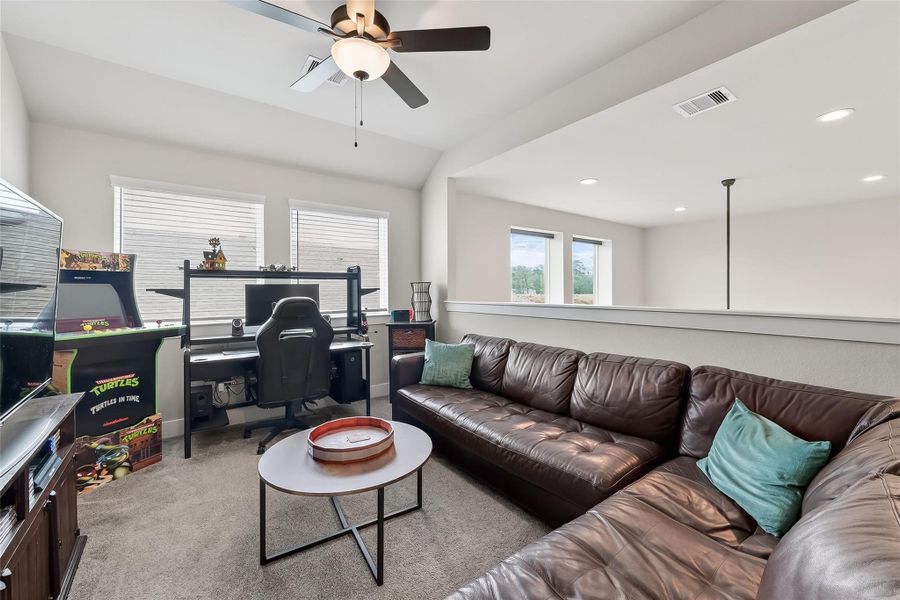 Game room overlooking the downstairs living room