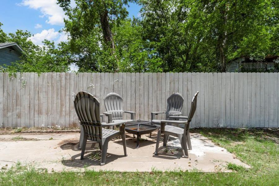 Fenced backyard with a patio Fenced backyard with a patio