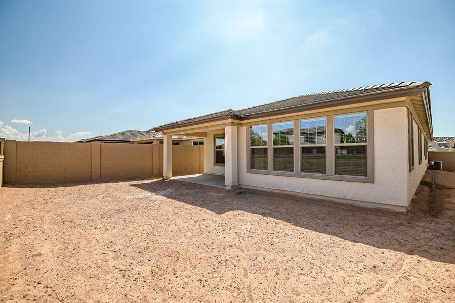 Front exterior of a new home in Mesquite at North Creek, Queen Creek, AZ, highlighting curb appeal (Image 27). Front exterior of a new home in Mesquite at North Creek, Queen Creek, AZ, highlighting curb appeal (Image 27).