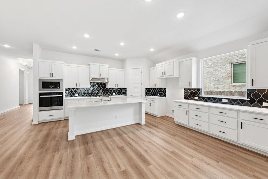 Furnished interior view inside a new home in University Heights, Round Rock (Image 6).