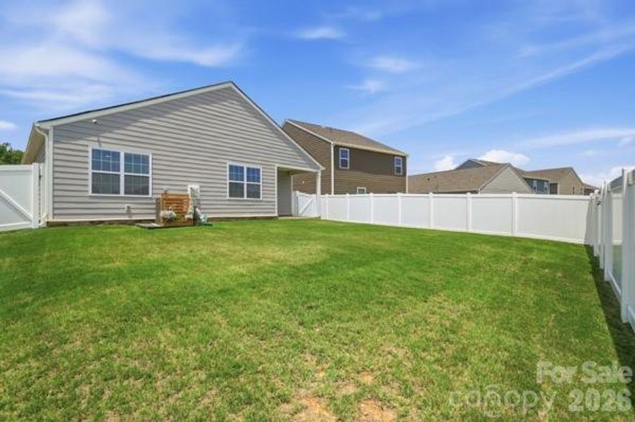 Exterior details and patio area of a home in Secrest Commons, Monroe (Image 25).
