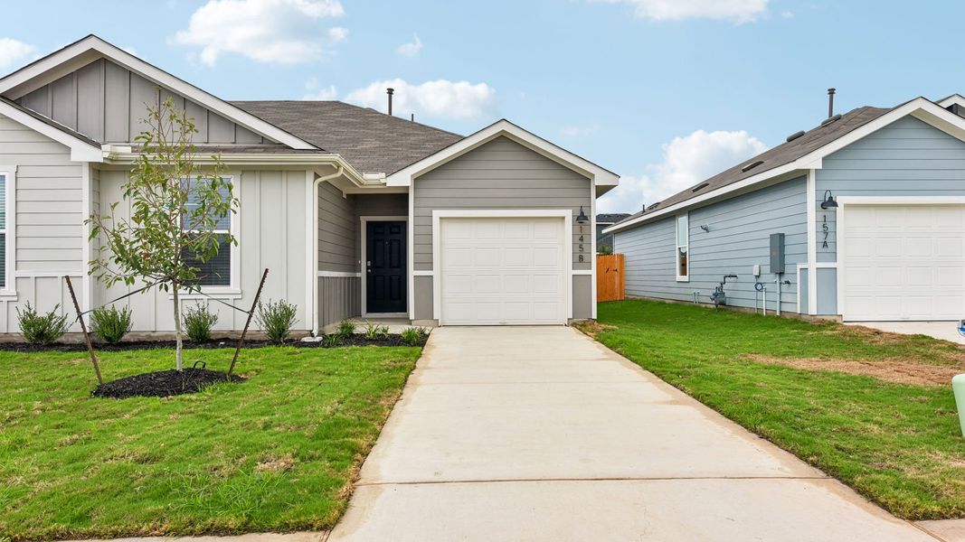 Front exterior of a new home in Wayside, Uhland, TX, highlighting curb appeal (Image 20). Front exterior of a new home in Wayside, Uhland, TX, highlighting curb appeal (Image 20).