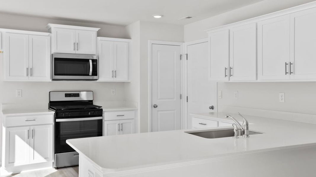 Furnished interior view inside a new home in Village Grove, Greenville (Image 8).
