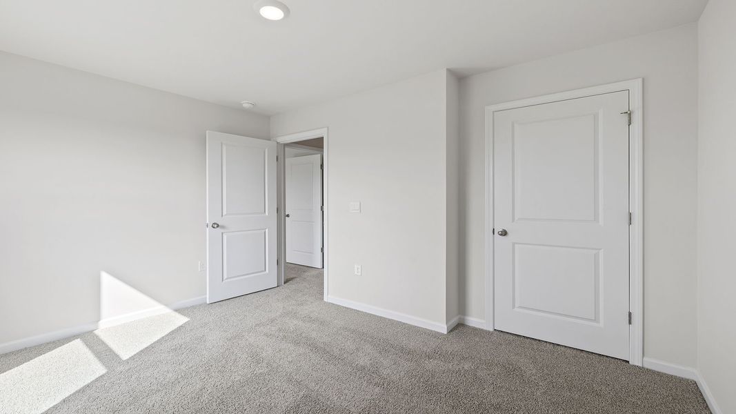 Spacious, unfurnished interior of a new home in Lightwood Cottages, Moore (Image 23).